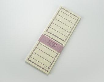 Tarjeta de notas plegada con tipografía