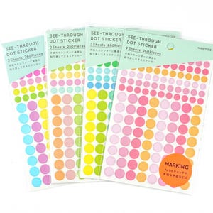 May include: Four sheets of colorful see-through dot stickers. Each sheet has 260 dots in various sizes and colors, including pink, yellow, orange, and blue. The sheets are labeled "See-Through Dot Sticker" and "2 Sheets 260 Pieces".