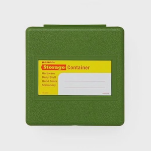 May include: Green storage container with a yellow label that reads "Storage Container." The label also lists "Hardware, Daily Stuff, Hand Tools, Stationery." The container is designed to store various items.