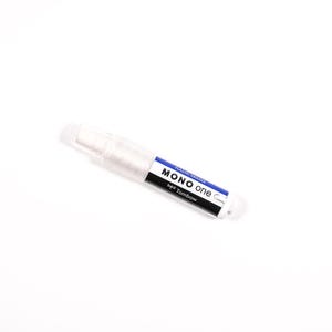 May include: A white plastic eraser with a blue and white label that says "MONO one" and "Tombow" in black text. The label also says "Plastic Eraser".