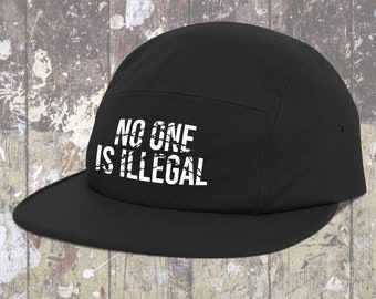No One Is Illegal Camper cap