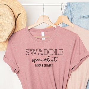 Labor and Delivery Nurse Tshirt | Swaddle Specialist | NICU Nurse | Postpartum Nurse Tee Shirt | Nurse Gift | T-Shirt for Nurses