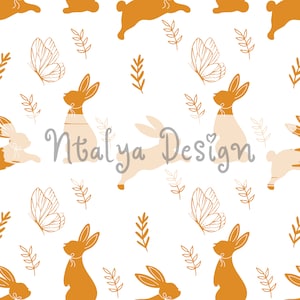 May include: A seamless pattern featuring a repeating design of orange bunnies, butterflies, and leaves on a white background. The text "Ntaliya Design" is written in a gray font in the center of the pattern.