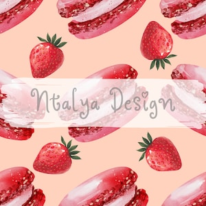 May include: A seamless pattern featuring pink and white macarons and red strawberries on a light pink background. The text "Natalya Design" is written in white on a white brushstroke.