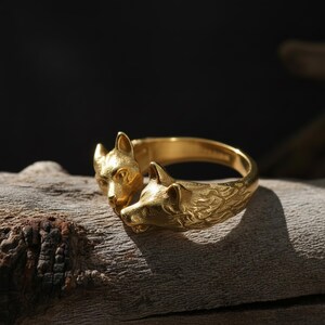 Kissing dogs ring, dog lover inspired animal jewelry, symbolic friendship statement band, and handcrafted cute accessory designed for those who are drawn to love, loyalty, and emotional connection. This charming ring features two detailed dog figures in a kissing pose, creating a heartwarming and playful design that represents affection, companionship, and unconditional love.