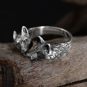 Kissing dogs ring, dog lover inspired animal jewelry, symbolic friendship statement band, and handcrafted cute accessory designed for those who are drawn to love, loyalty, and emotional connection. This charming ring features two detailed dog figures in a kissing pose, creating a heartwarming and playful design that represents affection, companionship, and unconditional love.