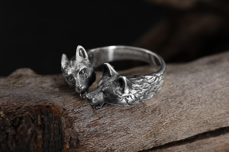 Kissing dogs ring, dog lover inspired animal jewelry, symbolic friendship statement band, and handcrafted cute accessory designed for those who are drawn to love, loyalty, and emotional connection. This charming ring features two detailed dog figures in a kissing pose, creating a heartwarming and playful design that represents affection, companionship, and unconditional love.