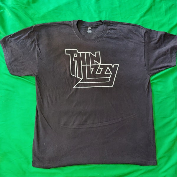 Thin Lizzy black t-shirt with the band’s classic logo on the front and the 2011 US tour dates on the back