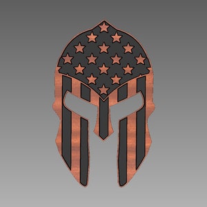 May include: A black and copper Spartan helmet with the American flag design. The helmet has a black background with red and white stripes and white stars.
