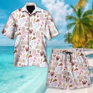 May include: White button-down shirt and matching shorts set with a colorful pattern of cartoon food and character icons. The pattern includes popcorn, ice cream, pizza, and balloons. The shorts have a drawstring waist.