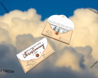 May include: Two wooden money holders with a light brown finish, one containing a US $100 bill. The holders have a white top section with the words "WITH LOVE ON YOUR CHRISTENING DAY" in a script font. Each holder has a small brown button closure.