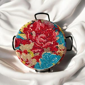 Juego de posavasos con diseño de diamantes y flores