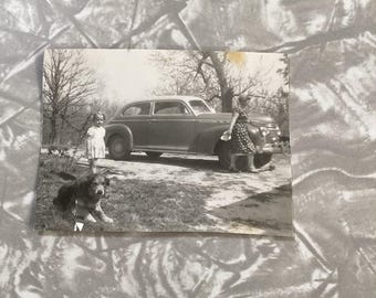 Vintage 1940s Black and White Photograph of Family and Classic Car