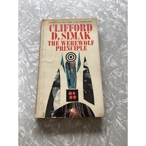 May include: A vintage paperback book titled "The Werewolf Principle" by Clifford D. Simak. The cover features a retro design with a central figure, geometric shapes, and the title in bold red letters. The book is a science fiction novel.