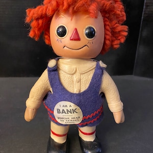 Vintage Raggedy Ann Bank from 1974. Made in America of Plastic with Yarn Hair.