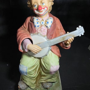 A Melody In Motion &#39;Banjo Clown&#39; Porcelain Musical Figure
