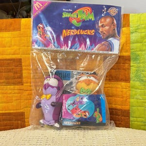Vintage 1996 McDonalds Plush Toy Space Jam NerdLucks - Sealed in Original Bag - McDonald’s TuneSquard - New Unopened