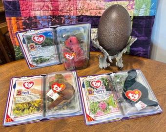 Trio di dinosauri Ty Vintage 2000 - McDonald's Teenie Beanie Babies 2000 Series - Nuovo nella confezione - Bronty, Rex e Steg - Venduto separatamente