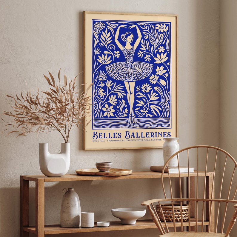 May include: A blue and white poster with a ballerina in a white tutu dancing in a field of flowers. The poster reads "Belles Ballerines Music Hall - 4 Performances Lincoln Center Plaza, New York, NY"