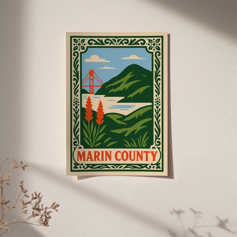 May include: A Marin County art print depicting the Golden Gate Bridge, green hills, and blue skies. The print has a decorative border and the words "Marin County" in red. The artwork is a vintage travel poster style.