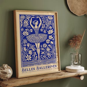 May include: A blue and gold poster with a ballerina dancing in a field of flowers. The poster reads "Belles Ballerines, Music Hall, 4 Performances, Lincoln Center Plaza, New York, NY 10023".