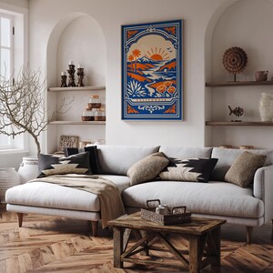 May include: A rectangular wall art print featuring a stylized California landscape with a rising sun, palm trees, mountains, and poppies in shades of blue, orange, and cream. The word CALIFORNIA is printed in a decorative frame at the bottom.