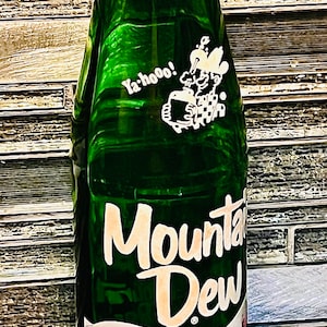 Vintage HillBilly Mountain Dew Bottle. “Laughing Pig”