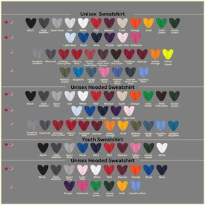May include: A color chart for unisex sweatshirts, hooded sweatshirts, and youth sweatshirts. The chart displays a variety of colors, including black, red, and blue, with text labels for each color option. The image is designed to showcase the available color choices for apparel.
