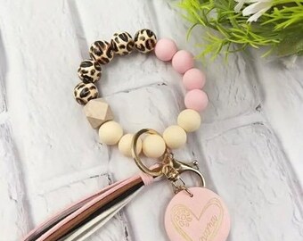Bracelet en perles bébé rose maman