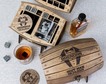 May include: Wooden gift sets for groomsmen and best man. Each set includes a personalized whiskey glass, coaster, and ice stones. The barrel-shaped box is engraved with the name "Brendan" and the date "08.24.2025".