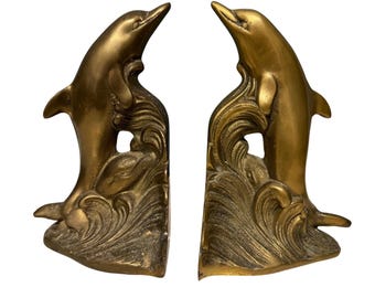 Sujetalibros vintage de latón macizo con forma de delfín saltando sobre una ola del océano, decoración náutica coreana.