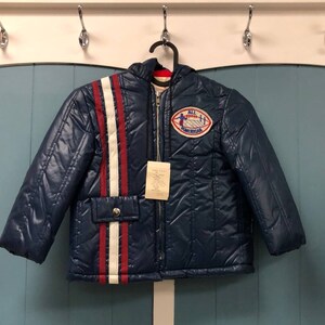 Vtg All-American football patch puffer hooded jacket made in USA