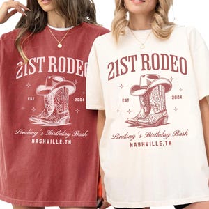 May include: Crimson and ivory-colored t-shirts with a rodeo-themed graphic. The design includes the text "21st Rodeo," a cowboy hat, boots, and the text "Lindsay's Birthday Bash, Nashville, TN."