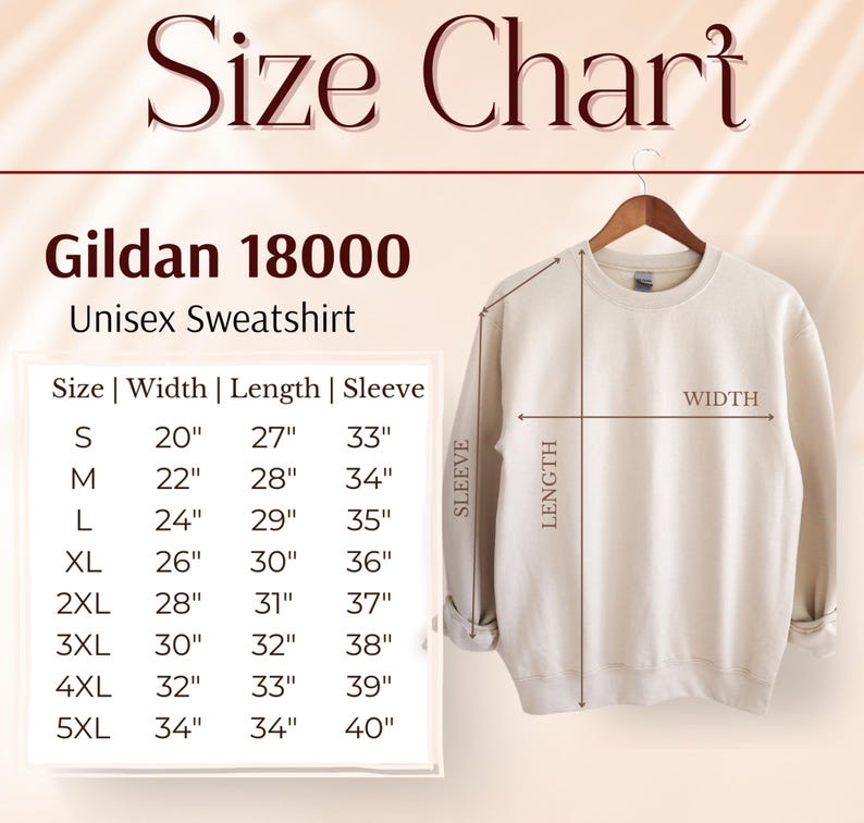 May include: A cream-colored Gildan 18000 unisex sweatshirt hangs on a wooden hanger. The image includes a size chart with measurements in inches for width, length, and sleeve length, ranging from size small to 5XL.