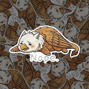 May include: A sticker featuring a cartoon griffin with a sad expression, lying down. The griffin has a white head, a yellow beak, and brown wings. The word "Nope" is written below the griffin.