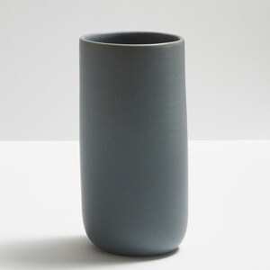 Modern handmade ceramic vase. Exceptionally handcrafted. Available in white, blue grey, sage green, grey, sand and black. Blue grey