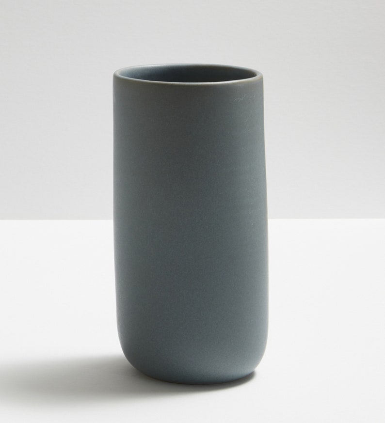 Modern handmade ceramic vase. Exceptionally handcrafted. Available in white, blue grey, sage green, grey, sand and black. Blue grey