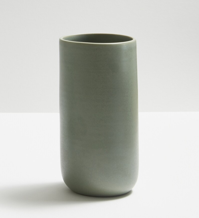 Modern handmade ceramic vase. Exceptionally handcrafted. Available in white, blue grey, sage green, grey, sand and black. Sage green