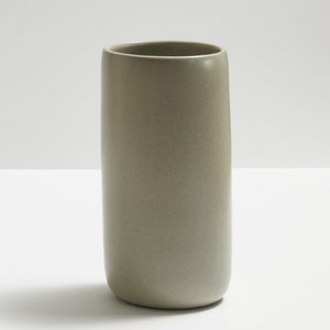 Modern handmade ceramic vase. Exceptionally handcrafted. Available in white, blue grey, sage green, grey, sand and black. Sand