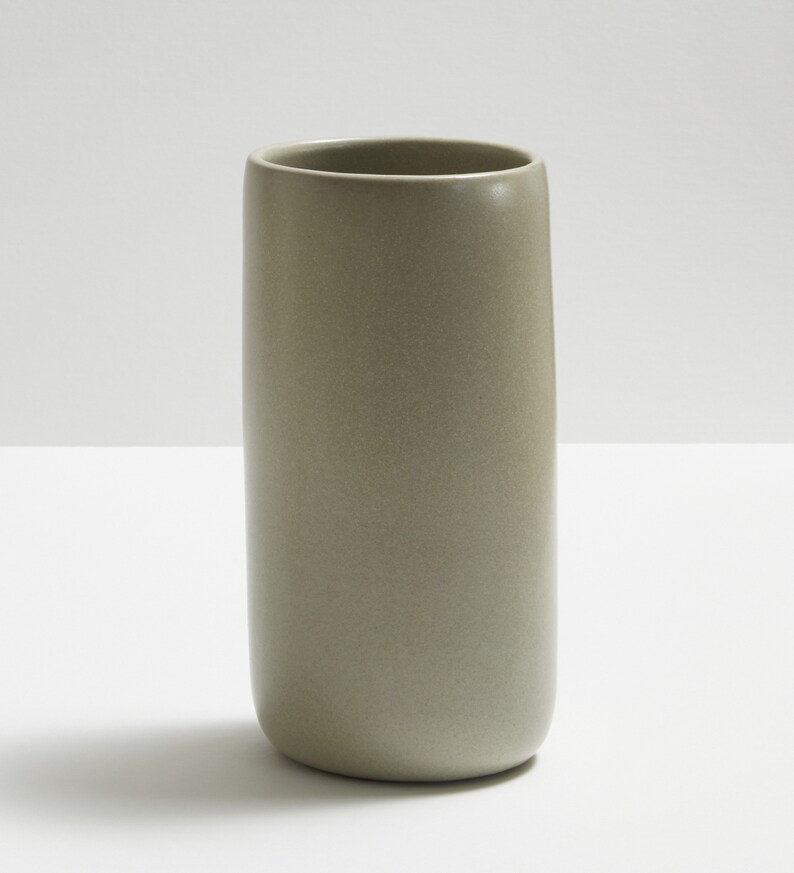 Modern handmade ceramic vase. Exceptionally handcrafted. Available in white, blue grey, sage green, grey, sand and black. Sand