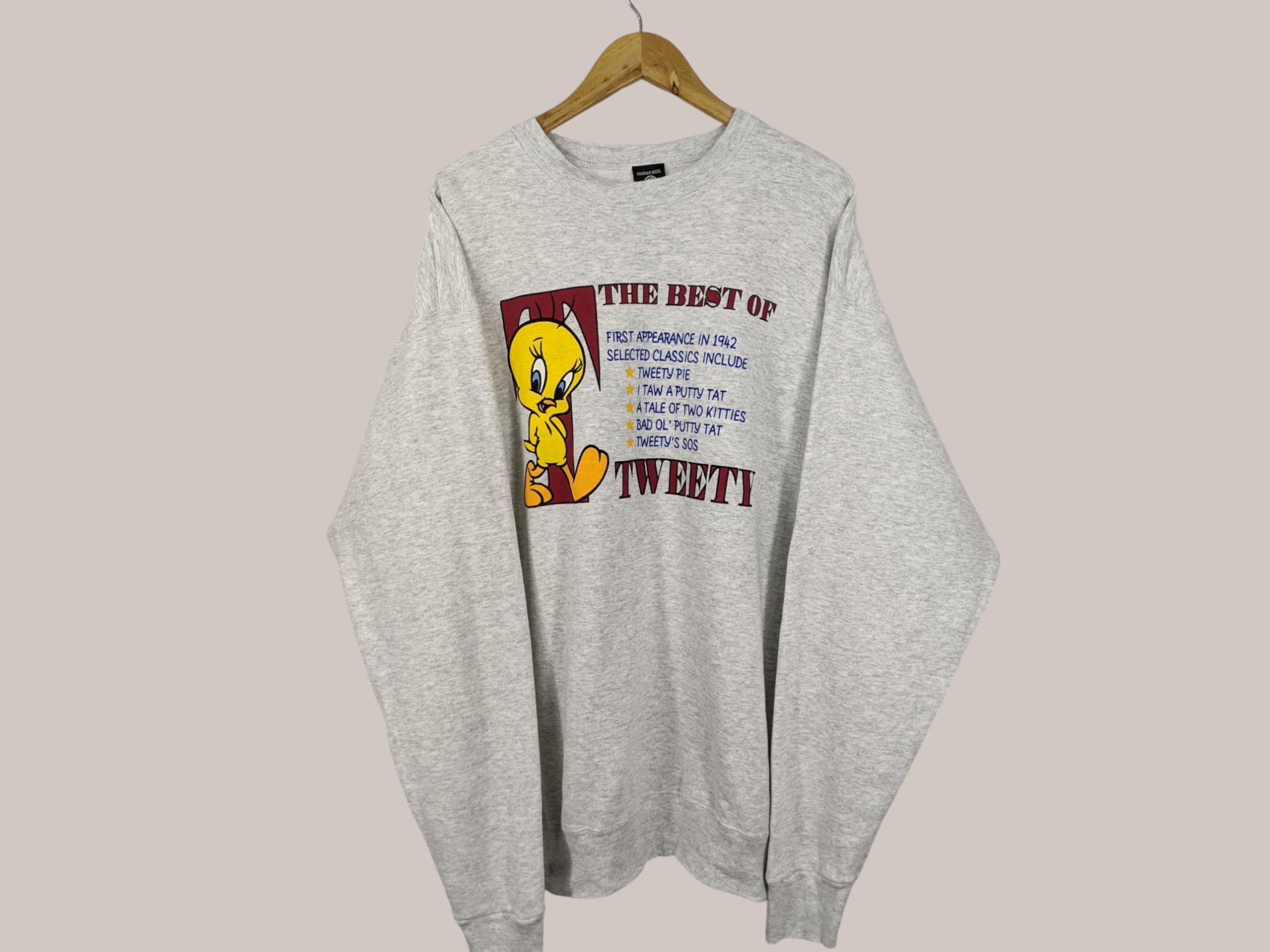 Tweety×Sylvester Design Sweat Tops Amazon.com: Looney Tunes Cute Tweety Bird Holding A Flower Logo