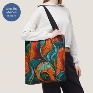 May include: A large tote bag with a colourful abstract pattern of swirling orange, blue, and green lines. The bag is 18x18 inches.