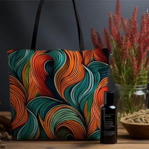 May include: A tote bag with a colourful abstract design featuring swirling orange, green, and blue lines. The bag has black handles.