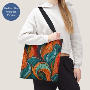 May include: A tote bag with a colourful abstract design featuring swirling lines in shades of orange, blue, and green. The bag is made of canvas and has a black strap. The bag measures 40x40 cm.