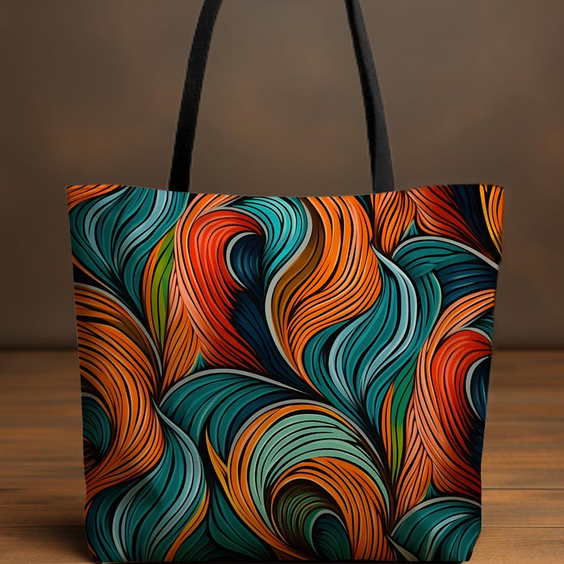 May include: A tote bag with a colourful abstract design featuring swirling lines in shades of orange, blue, and green.