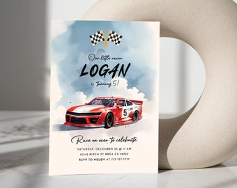 May include: A birthday invitation with a watercolor background featuring a red race car with a white stripe and the number 5 on the side. The text reads "Our little racer LOGAN is turning 5! Race on over to celebrate Saturday, December 25 at 11 AM 12345 Birch St Brea CA 98765 RSVP to Helen at 777-777-7777"