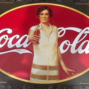 Vintage 1920s Coca-Cola Metal Sign Featuring Flapper Girl – Retro Soda Advertising Collectible Wall Decor