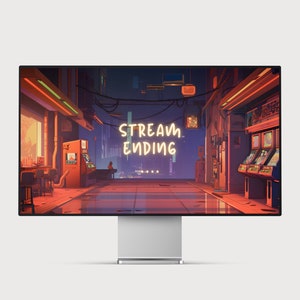 Może przedstawiać: Monitor komputerowy wyświetlający cyfrową ilustrację nocnej ulicy miejskiej. Tekst "STREAM ENDING" jest wyświetlany na znaku w neonowych ż&oacute;łtych literach.