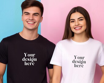 May include: Two people wearing blank white and black t-shirts with the text "Your design here" printed on the front.