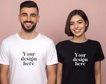 May include: Two people wearing blank white and black t-shirts with the text "Your design here" on the front.